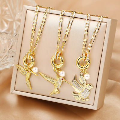 Aurielle | Pearl Bird Charm Necklace